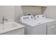 Laundry room with modern appliances, a sink, and countertop space at 4591 Gliding Wave St, Winter Garden, FL 34787