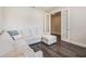 Comfortable living room with a sectional couch and view into another room at 4591 Gliding Wave St, Winter Garden, FL 34787