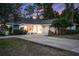 Charming single-story home with a well-manicured lawn and inviting curb appeal at 516 Fort Smith Blvd, Deltona, FL 32738