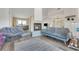 Cozy living room featuring a fireplace, comfortable seating, and a serene ambiance at 516 Fort Smith Blvd, Deltona, FL 32738