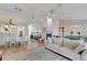 Open floor plan with a living room and dining area featuring a fireplace at 516 Fort Smith Blvd, Deltona, FL 32738
