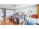 Bright bedroom featuring a sitting area and modern decor at 530 E Central Blvd # 1702, Orlando, FL 32801