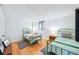 Cozy bedroom with twin beds, area rugs, and bedside tables at 530 E Central Blvd # 1702, Orlando, FL 32801