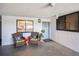 Inviting condo entrance featuring cozy seating and decorative plants by front door at 530 E Central Blvd # 1702, Orlando, FL 32801