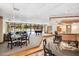 Spacious lounge area with a grand piano, bar, and comfortable seating at 530 E Central Blvd # 1702, Orlando, FL 32801