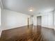 Hardwood floors and ensuite bathroom complement the primary suite creating a private retreat at 5481 Nokomis Cir, Orlando, FL 32839