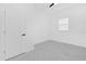 Simple bedroom with marble tiled floor, a window, and a ceiling fan at 600 Lakewood Ave, Ocoee, FL 34761