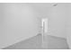 Bedroom featuring marble floors and a view into the hall at 600 Lakewood Ave, Ocoee, FL 34761