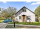 Charming home featuring a modern front design and a beautiful, well-manicured lawn at 600 Lakewood Ave, Ocoee, FL 34761