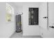 Utility room featuring a water heater and HVAC system at 600 Lakewood Ave, Ocoee, FL 34761