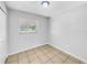 This bedroom provides an open canvas with neutral walls and great natural light at 619 Carver Dr, Lake Wales, FL 33853
