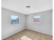 This bedroom provides an open canvas with neutral walls and great natural light at 619 Carver Dr, Lake Wales, FL 33853