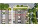 Birds eye view showcasing a townhome complex with well-kept landscaping and dedicated parking spaces for residents at 7010 Broomshedge Trl, Winter Garden, FL 34787