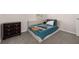 Bedroom with neutral walls and carpeted floor at 7010 Broomshedge Trl, Winter Garden, FL 34787