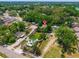 An aerial view of the neighborhood and property and surrounding landscape at 7506 Mott Ave, Orlando, FL 32810