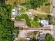 Aerial view of a property with trees and a red boundary line marking the perimeter at 7506 Mott Ave, Orlando, FL 32810