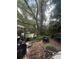 View of backyard with two chairs and fence at 7506 Mott Ave, Orlando, FL 32810