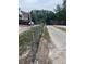 View down driveway toward street at 7506 Mott Ave, Orlando, FL 32810