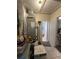 View of the home's utility area, including the HVAC system and additional storage at 7506 Mott Ave, Orlando, FL 32810