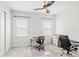 Bedroom offers ceiling fan and carpet floor. Ready to be turned into a cozy home office at 8210 Topsail Pl, Winter Garden, FL 34787