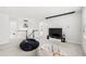 Upstairs bonus room with cozy seating and a TV for entertainment at 8210 Topsail Pl, Winter Garden, FL 34787