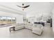 Spacious living room with a view of the pool and open to the kitchen at 8210 Topsail Pl, Winter Garden, FL 34787
