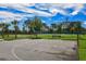 Outdoor basketball court for recreational activities within the community at 850 Spring Oak Cir, Orlando, FL 32828