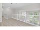 Open hallway overlooking the living room and front entrance allowing an open feel to the home at 850 Spring Oak Cir, Orlando, FL 32828