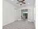 Bright office features wood-look flooring and French doors at 850 Spring Oak Cir, Orlando, FL 32828