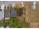 Aerial view of the home, focusing on the backyard, boundary, and adjacent properties at 9316 Dubois Blvd, Orlando, FL 32825