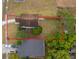 Aerial view of home and property, showing backyard, boundary, and surrounding neighborhood at 9316 Dubois Blvd, Orlando, FL 32825