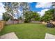 A spacious and well-maintained backyard with privacy fence at 9316 Dubois Blvd, Orlando, FL 32825