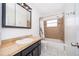 Clean and functional bathroom with updated vanity, toilet, and shower/tub combo, perfect for everyday use at 9316 Dubois Blvd, Orlando, FL 32825