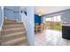 Bright dining room with a sliding glass door and stairway at 9316 Dubois Blvd, Orlando, FL 32825