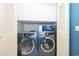 Laundry area featuring new Samsung washer and dryer units at 9316 Dubois Blvd, Orlando, FL 32825
