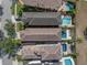 Aerial view of homes and pools at 960 Golden Bear Dr, Reunion, FL 34747