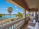 Balcony view overlooking the lake at 960 Golden Bear Dr, Reunion, FL 34747
