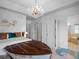 Themed bedroom with a boat bed, chandelier, mural, and ample natural light at 960 Golden Bear Dr, Reunion, FL 34747