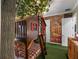 Creative room with tree house bunk bed, forest mural, artificial tree, and unique lighting at 960 Golden Bear Dr, Reunion, FL 34747