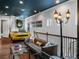 Loft game room featuring a car pool table, a comfortable couch, and cool lighting at 960 Golden Bear Dr, Reunion, FL 34747