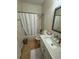 Cozy bathroom featuring a shower-tub combination and a single sink vanity at 9959 Cypress Vine Dr, Orlando, FL 32827