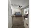 This bedroom offers hardwood floors and a modern ceiling fan for added comfort at 9959 Cypress Vine Dr, Orlando, FL 32827