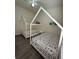 Bedroom featuring hardwood floors, two beds, and a ceiling fan at 9959 Cypress Vine Dr, Orlando, FL 32827
