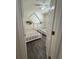 Bedroom featuring hardwood floors, two beds, and a ceiling fan at 9959 Cypress Vine Dr, Orlando, FL 32827