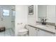 Clean bathroom with tub/shower combo, and a single sink vanity with granite countertops at 1018 Featherstone Cir, Ocoee, FL 34761