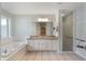 Spacious bathroom featuring a tub, double sink vanity with granite countertops, and a glass enclosed shower at 1018 Featherstone Cir, Ocoee, FL 34761