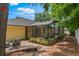 The screened-in pool features a brick patio and tranquil landscaping providing a relaxing backyard oasis at 1018 Featherstone Cir, Ocoee, FL 34761
