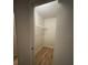 Small, walk-in closet with shelves at 1071 S Hiawassee Rd # 1211, Orlando, FL 32835