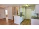Bright kitchen with white cabinets, sleek countertops, and stainless steel appliances at 1071 S Hiawassee Rd # 1211, Orlando, FL 32835