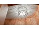 Decorative ceiling fixture with a distinctive circular design at 11502 Waterstone Loop Dr, Windermere, FL 34786